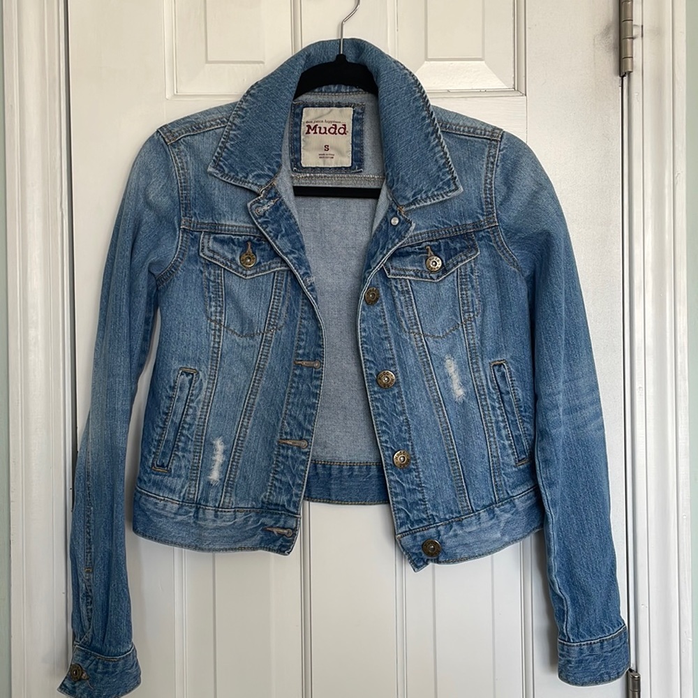 Slightly distressed, cropped Jean jacket.